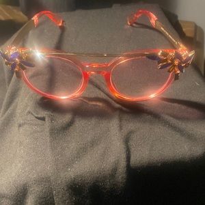 Pink frames with jewelry